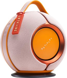 Портативна Bluetooth-колонка DEVIALET Mania рожевого кольору, сферичної форми з інтегрованою ручкою та видимим помаранчевим боком