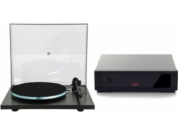 Black Rega P3 turntable with its clear dust cover raised and a turquoise-edged platter, with a black Rega box beside it