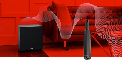 Černý bezdrátový reproduktor, červený subwoofer, černý kabel na geometrickém červeno-černém pozadí