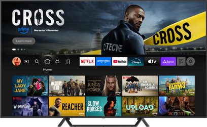 Panasonic TV-75W95BEG højopløsnings-tv i sort med tynd metalramme og tilpassede vinklede ben, set forfra, skærm tændt med en farverig streaming-interface