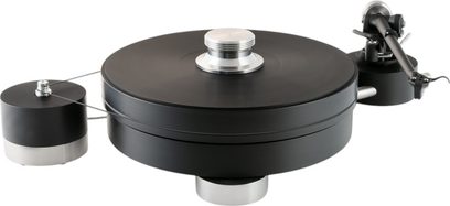 Hi-Fi plak çalar Transrotor Max Nero TRA Studio, siyah metal gövde, kalın dairesel plak tablası, alüminyum gümüş rengi detaylar, dıştan kayışla bağlı silindirik motor ve sağ tarafta tüp şeklinde ton kolu, üç çeyrek görünüm