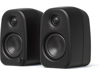 Pair of compact black Kanto UKI speakers with rounded corners, featuring a tweeter, woofer, and front button