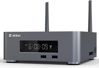 Multimediální přehrávač Zidoo Z10 PRO v tmavě šedé barvě, pohled zepředu, bílý LED displej, dva USB porty na přední straně