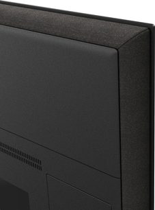 Panasonic TV-55Z95B højopløsnings-tv i mat sort, bagpanel i plast med øverste kant og sidekant i tekstureret stof, synlige ventilationsåbninger, nærbillede af bagsiden fra siden