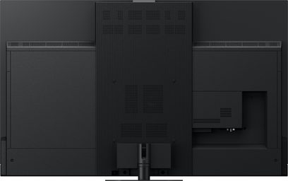 Panasonic TV-65Z95AEG -teräväpiirtotelevisio, takanäkymä, keskellä uurrettu paneeli, tuuletusritilät, liitännät oikeassa alakulmassa
