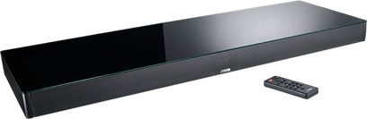 Canton Smart Sounddeck 100 soundbar in zwart hoogglans, groot rechthoekig plateau met geperforeerde voorzijde en afstandsbediening