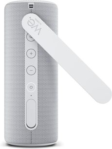 Altavoz Bluetooth portátil Loewe We. HEAR 2 gris claro, vista frontal, formato cilíndrico con correa integrada