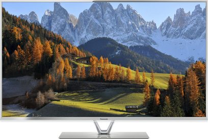 Panasonic TX-L42DT60E-tv, der viser et efterårslandskab med sneklædte bjerge og farverige skove