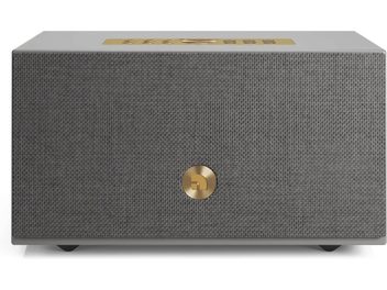 Enceinte connectée Audio Pro C5 MKII W grise, façade texturée avec logo doré central et commandes dorées sur le dessus