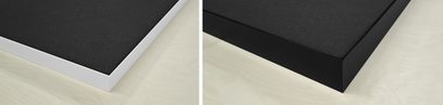 Artnovion Chroma Panelling-absorber, sort tekstureret akustikpanel med hvid eller sort ramme, set fra vinkel
