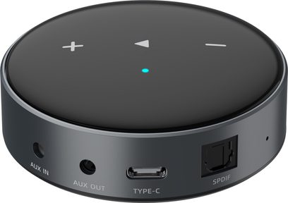 WiiM Mini võrguaudiopleier mustas ümaras vormis puuteelementide ja AUX, USB‑C ning SPDIF ühendustega kolmveerand vaates