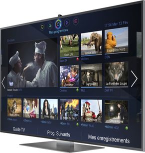 Samsung UE65F9000-fjernsyn, der viser en brugergrænseflade med miniaturebilleder af TV-programmer, film og sport