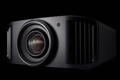 JVC DLA-NZ9 black projector, close-up front view, centered lens with chrome ring, side ventilation grilles
