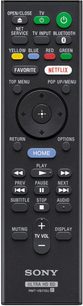 Sort Sony Ultra HD BD RMT-VB100 fjernbetjening med flerfarvet knapper og LCD-skærm, der viser "HOME", set forfra