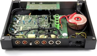 Rega Aura MC black phono preamp, open top view revealing printed circuit boards, electronic components, and toroidal transformer