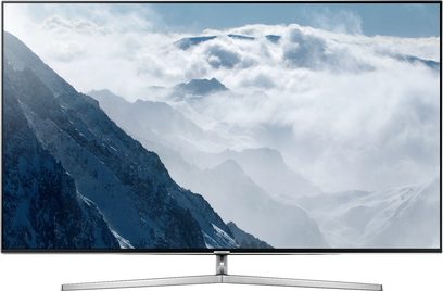 Samsung UE75KS8000 fladskærms-TV med billede af sneklædte bjerge i skyer, set forfra, på metalfod