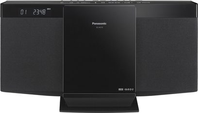 Kompaktní černý stereo hi-fi systém Panasonic SC-HC15 s LCD displejem zobrazujícím „23:48“, pohled zepředu