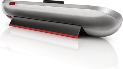 Philips DS7700 dockingstation i metalgrå, set fra siden, oval langstrakt form, rød stribe på kanten