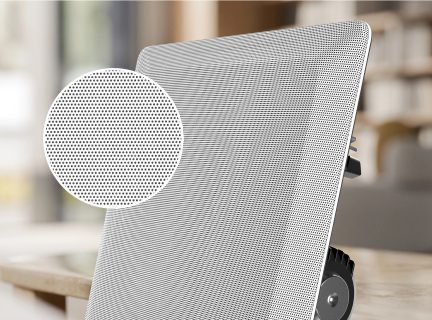 Panneau rectangulaire incliné avec surface perforée blanche, zoom circulaire sur les perforations, support visible avec roue noire