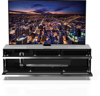 TV-møbel Spectral Scala SC1656 i sort med fladskærm, der viser et natligt luftfoto af en stor oplyst by
