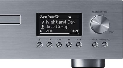 Technics SL-G700 silver CD player, front view of the control panel with LCD screen displaying information, buttons, and control knob