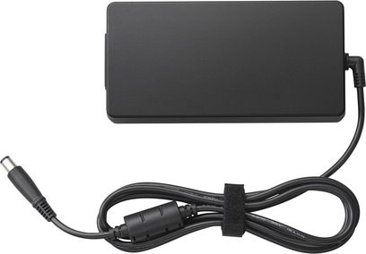 Rectangular black plastic power supply, top view, cable with ferrite bead, DC plug, and Velcro strap