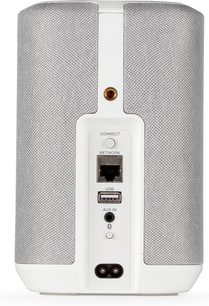 Witte Denon Home 150 slimme luidspreker, achteraanzicht met lichte stoffen grille en Ethernet-, USB- en jack-ingangspoorten