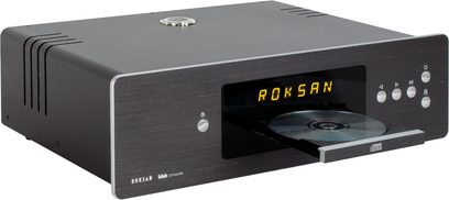 Roksan blak CD atskaņotājs ar ogles pelēku krāsu, taisnstūrveida pelēku antracīta korpusu, melnu priekšējo paneli ar dzeltenu "ROKSAN" displeju