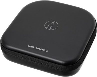 Lukket Audio-Technica ATH-DSR9BT hovedtelefon i sort, set ovenfra, med hvidt trekantlogo på ørepuden
