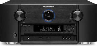 Ampli home-cinéma Marantz SR7015 noir, vue de face, affichage bleu "Blu-ray Dolby Atmos", boutons et prises en façade
