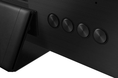 Samsung QE85QN800A TV, nærbillede fra siden, 4 ovale sorte højttalere integreret i højre side af den matsort ramme
