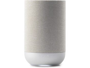 Підключена акустична система Denon Home 200 у кам’яно-сірому циліндричному корпусі, зі світло-сірою тканинною сіткою та заокругленою білою основою, вид спереду