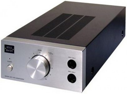 STAX SR-727II hovedtelefonforstærker, mørk grå metalkabinettet, frontpanel med knapper og stik, let skråt forfra-perspektiv