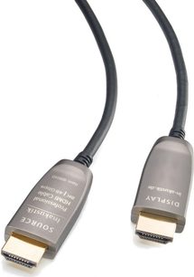 Due connettori HDMI grigi Inakustik "Cavo ottico HDMI 2.1 pro 50m" collegati da un cavo nero, visti di profilo