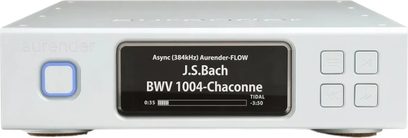 Aurender N150 sølvfarvet netværksafspiller, set forfra med skærm, der viser J.S. Bach, og sidebetjeningselementer