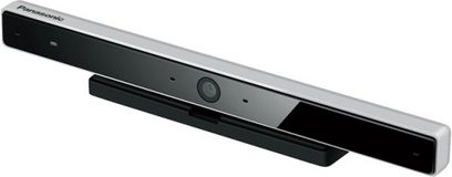Czarna i biała kamera Skype Panasonic TY-CC20W, widok z przodu i z boku, wydłużony prostokątny kształt z zaokrąglonymi krawędziami