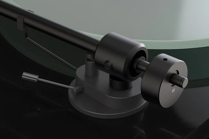 Pro-Ject T1 EVO BT hi-fi turntable with black tonearm, cylindrical counterweight, and translucent green glass platter