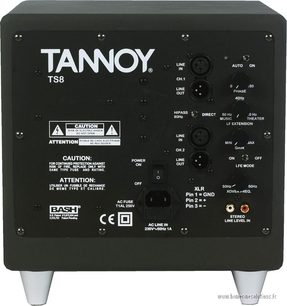 Frontvisning af Tannoy TS8 basreflekskabinet med tilslutninger, justeringer og logo på sort panel, sølvfarvede koniske fødder