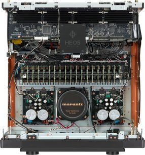 Front view of an open Marantz AV 10 home theater preamplifier, showing electronic components and power supply transformer