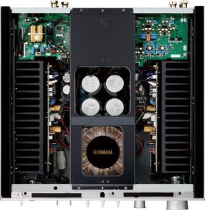 Amplificatore hi-fi stereo Yamaha A-S1200 argento, vista frontale, coperchio aperto che rivela componenti elettronici interni e trasformatore toroidale