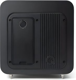 Q Acoustics Q SUB80 matte black subwoofer, cube-shaped enclosure made of composite material with rounded corners, grooved rear panel featuring a level knob and metal cone feet, rear view from the front