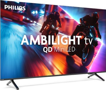 Philips 65MLED910 højopløsnings-tv i sort, slankt metalramme med to V-formede fødder, set forfra let fra siden