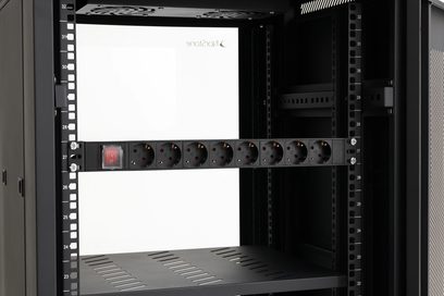 Audiovisual rack with red switch power strip and 8 SCHUKO sockets, partial front view with numbered uprights