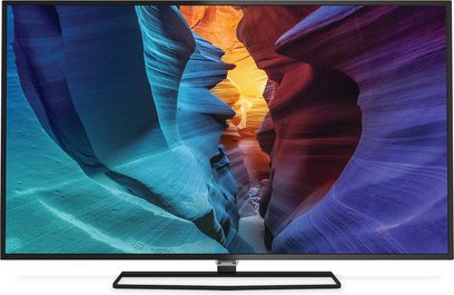 Nærbillede af skærmen på et Philips 50PUH6400 tv, der viser et farverigt billede af en klippefyldt kløft