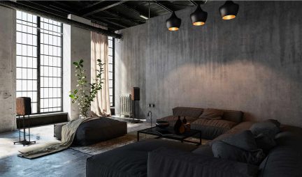 A living room with concrete walls, large windows, gray sofas, a black coffee table, black pendant lamps, and a green plant