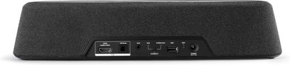 Sort, kompakt, rektangulær Polk Audio MagniFi Mini AX soundbar med tilslutninger og kontrolknapper på toppen