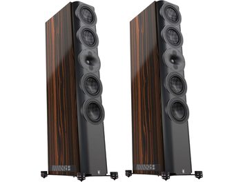 S7t Custom ebony põrandakõlarid, vaade eest ja kergelt nurga alt, 6 musta ümmargust kõlarielementi, metallist alused nelja jalaga