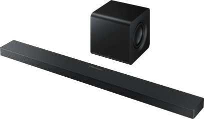 Soundbar Samsung HW-QS710F 2025 nera con griglia metallica e subwoofer cubico nero, vista a tre quarti