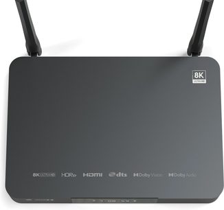 Zidoo Z9X 8K medieafspiller, set ovenfra, sort rektangulært kabinet, afrundede hjørner, 2 antenner, teknologilogoer