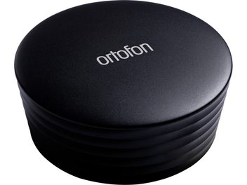 Palet prensador Ortofon Record Stabilizer Heavy negro, vista en perspectiva, superficie superior lisa con logo, lados ranurados